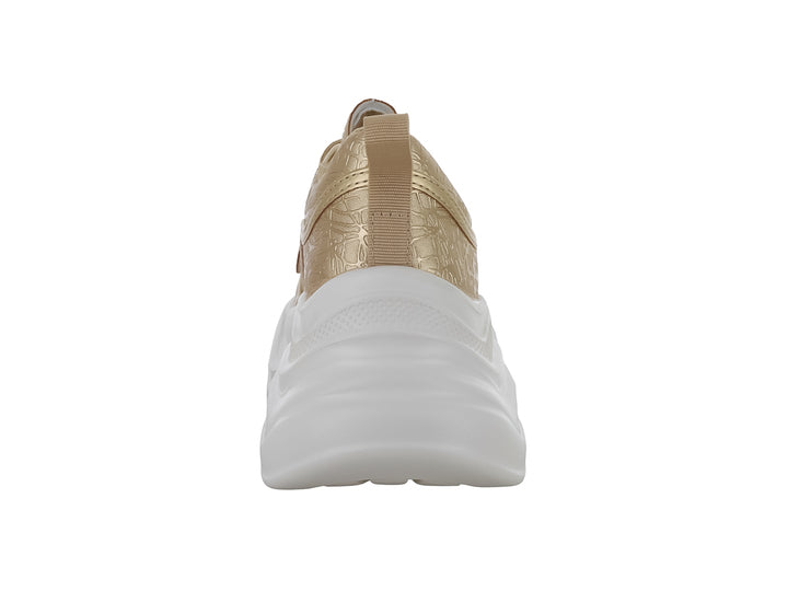 Tenis PLATINI color dorado con suela blanca ancha y plataforma