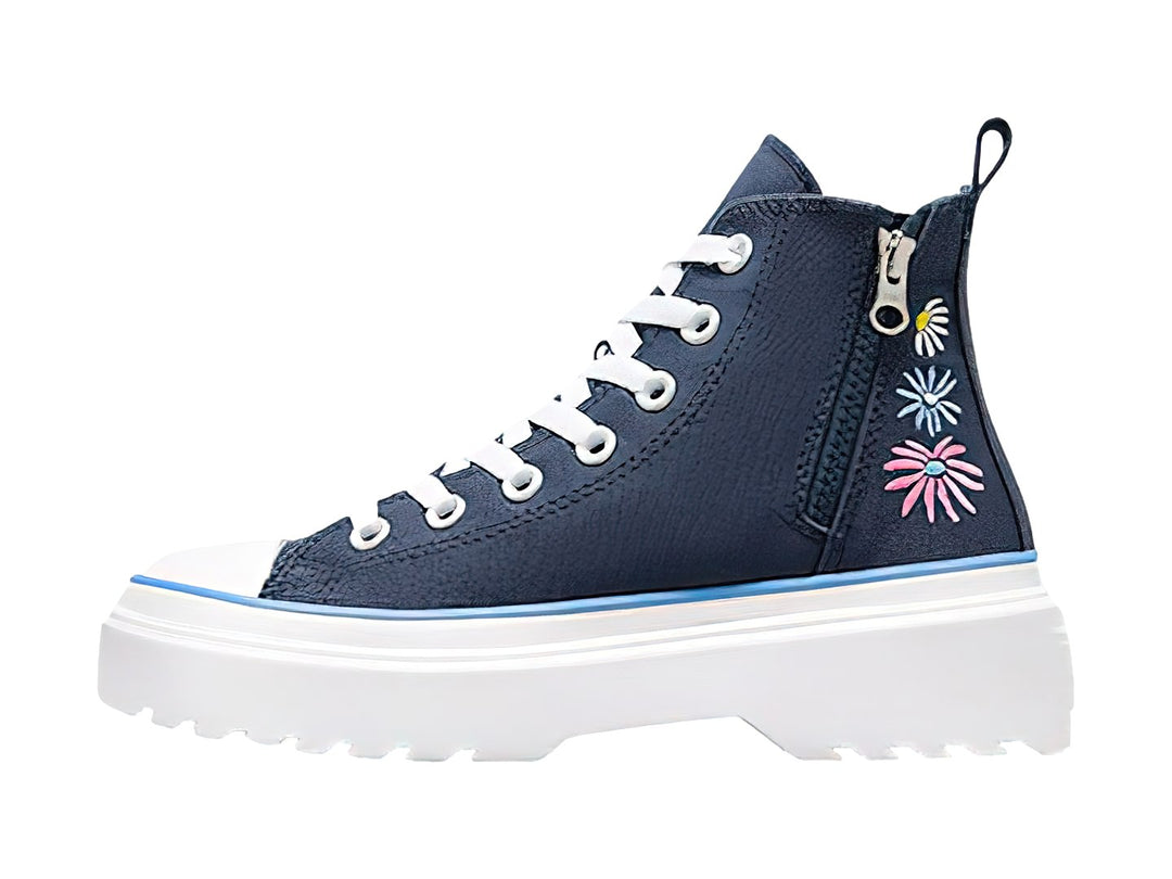 Tenis Converse Chuck Taylor All Star de bota color azul marino con suela plataforma blanca y línea azul claro.