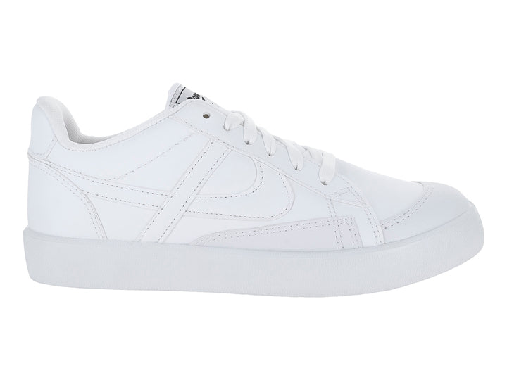 Tenis deportivos color blanco para niños de la marca Panam, con agujetas y suela blanca.
