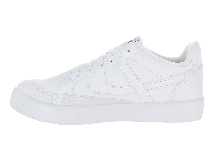 Tenis deportivos color blanco para niños de la marca Panam, con agujetas y suela blanca.