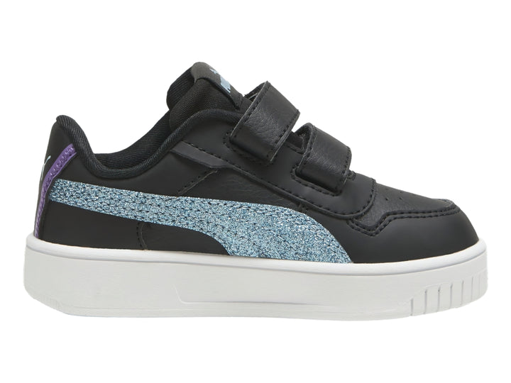 Tenis PUMA negros para niños con franja turquesa brillante y suela blanca.