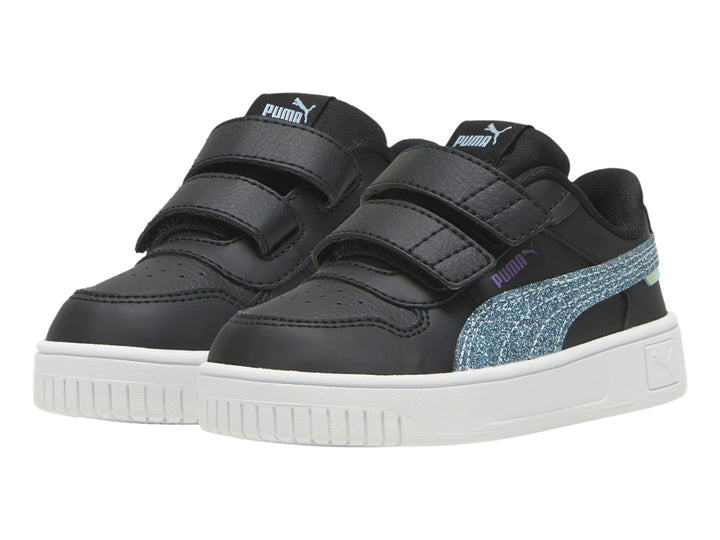 Tenis PUMA negros para niños con franja turquesa brillante y suela blanca.