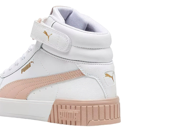 Tenis PUMA Carina 2.0 Mid color blanco con detalles y suela en rosa cuarzo.