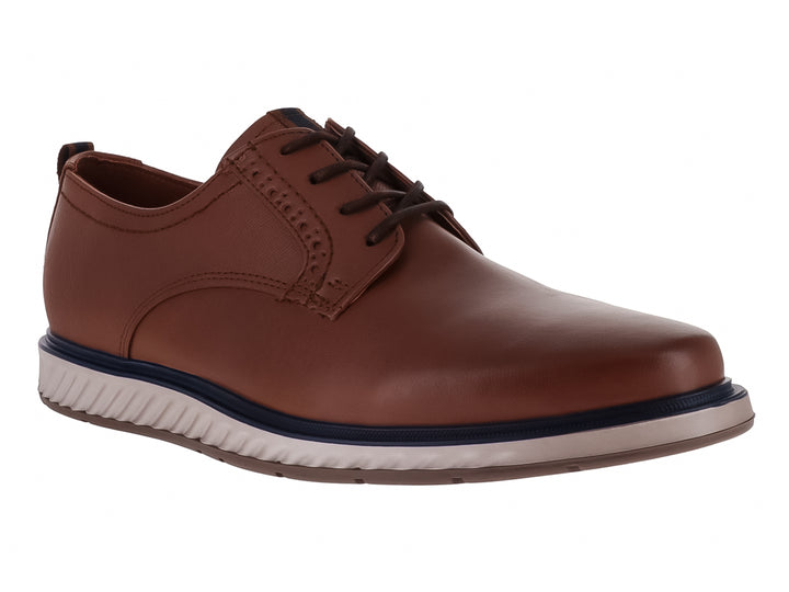 Zapato casual color camel con suela blanca y detalle en azul marino, cierre de cordones.