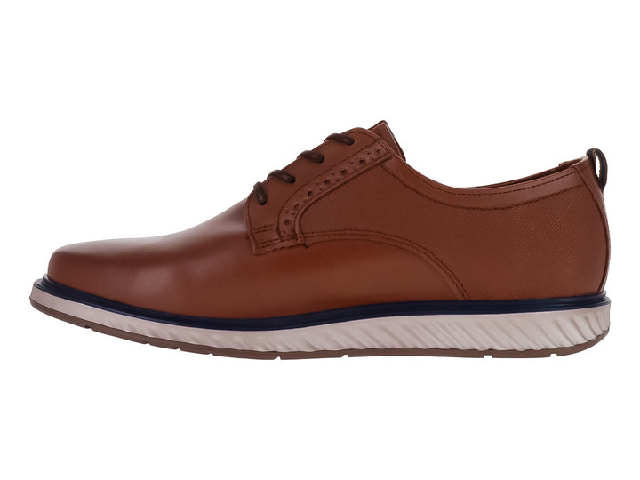 Zapato casual color camel con suela blanca y detalle en azul marino, cierre de cordones.