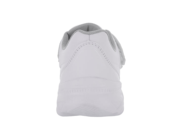 Tenis deportivos blancos para niños de la marca Karsten con cierre de velcro.