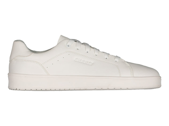 Tenis deportivos Charly de color blanco con agujetas y suela blanca, vista lateral.