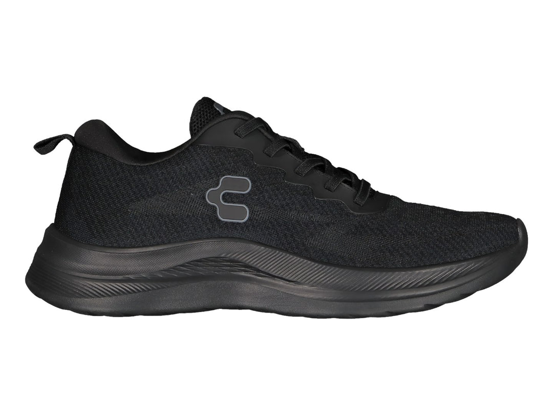 Tenis deportivos Charly en color negro total con suela ergonómica y parte superior de malla transpirable.