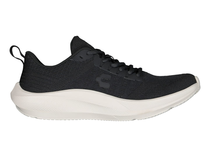 Tenis deportivos Charly color negro con suela blanca y tejido transpirable.