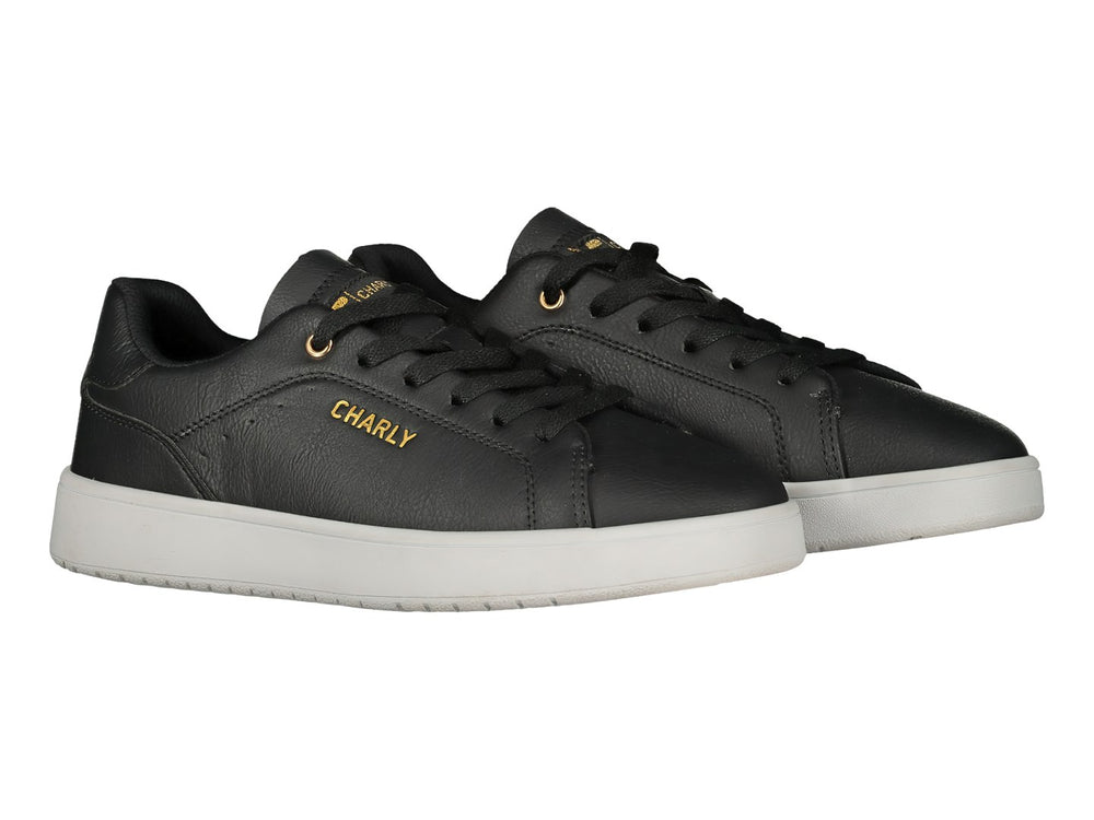 Tenis deportivos Charly en color negro con suela blanca y detalles dorados.