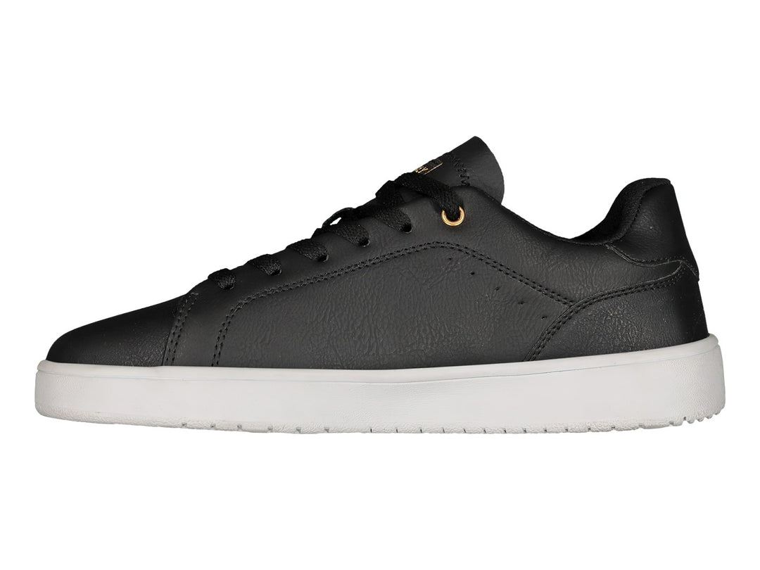 Tenis deportivos Charly en color negro con suela blanca y detalles dorados.