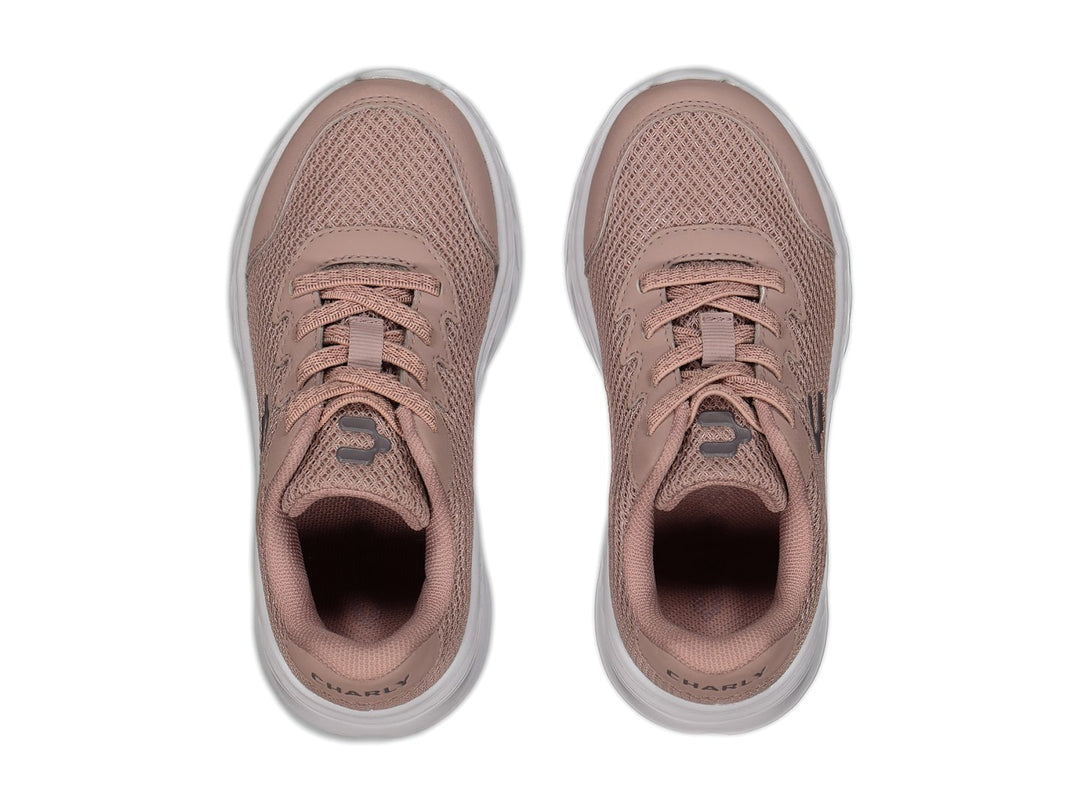 Tenis deportivos Charly color rosa con suela blanca y tejido de malla.