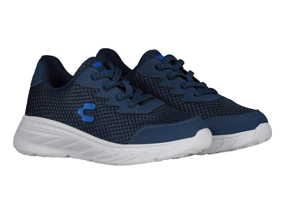 Tenis deportivos Charly en color azul marino con suela blanca y detalles en azul brillante.