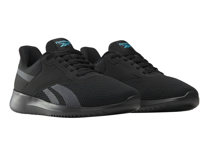 Tenis deportivos Reebok color negro con detalles en gris y suela negra.