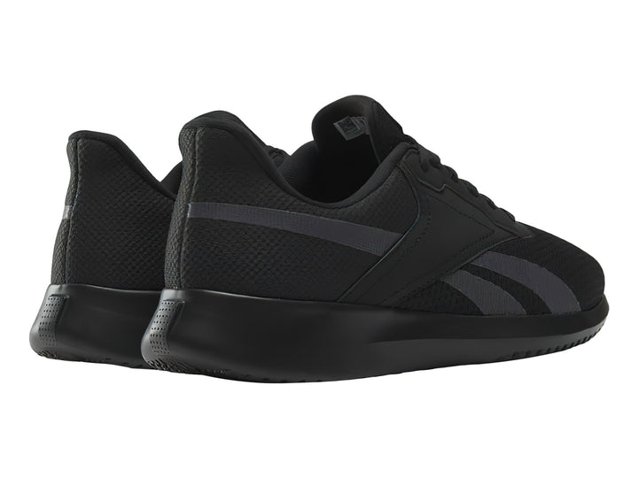 Tenis deportivos Reebok color negro con detalles en gris y suela negra.