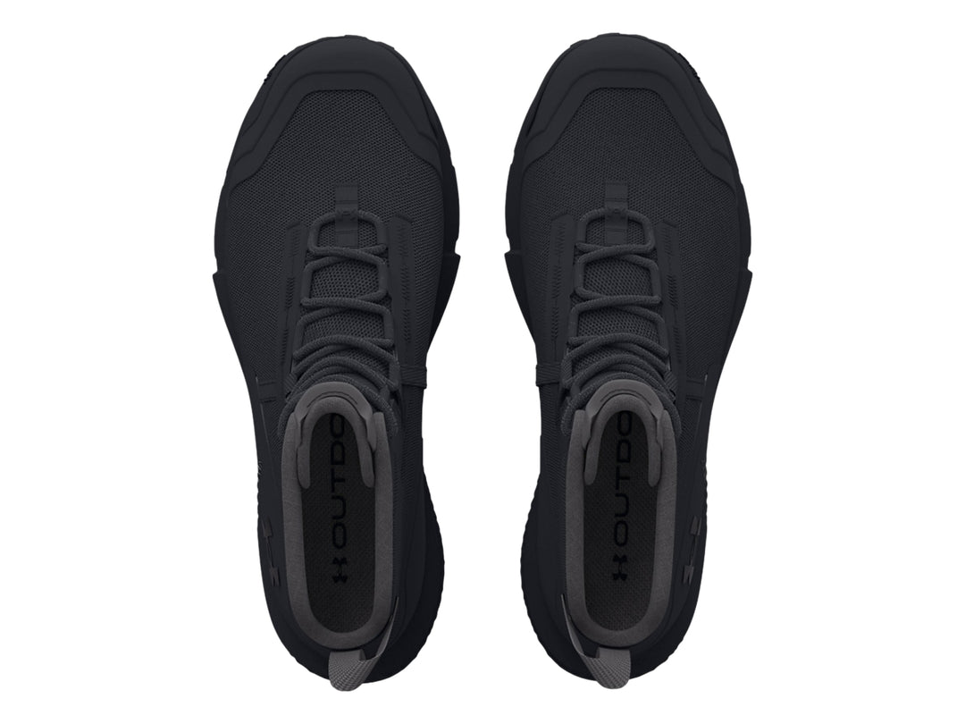 Botín deportivo Under Armour Charged Valsetz Mid en color negro con suela robusta y corte medio.