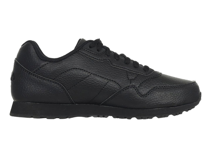Tenis deportivos FILA para niño en color negro total con acabado mate y textura granulada.