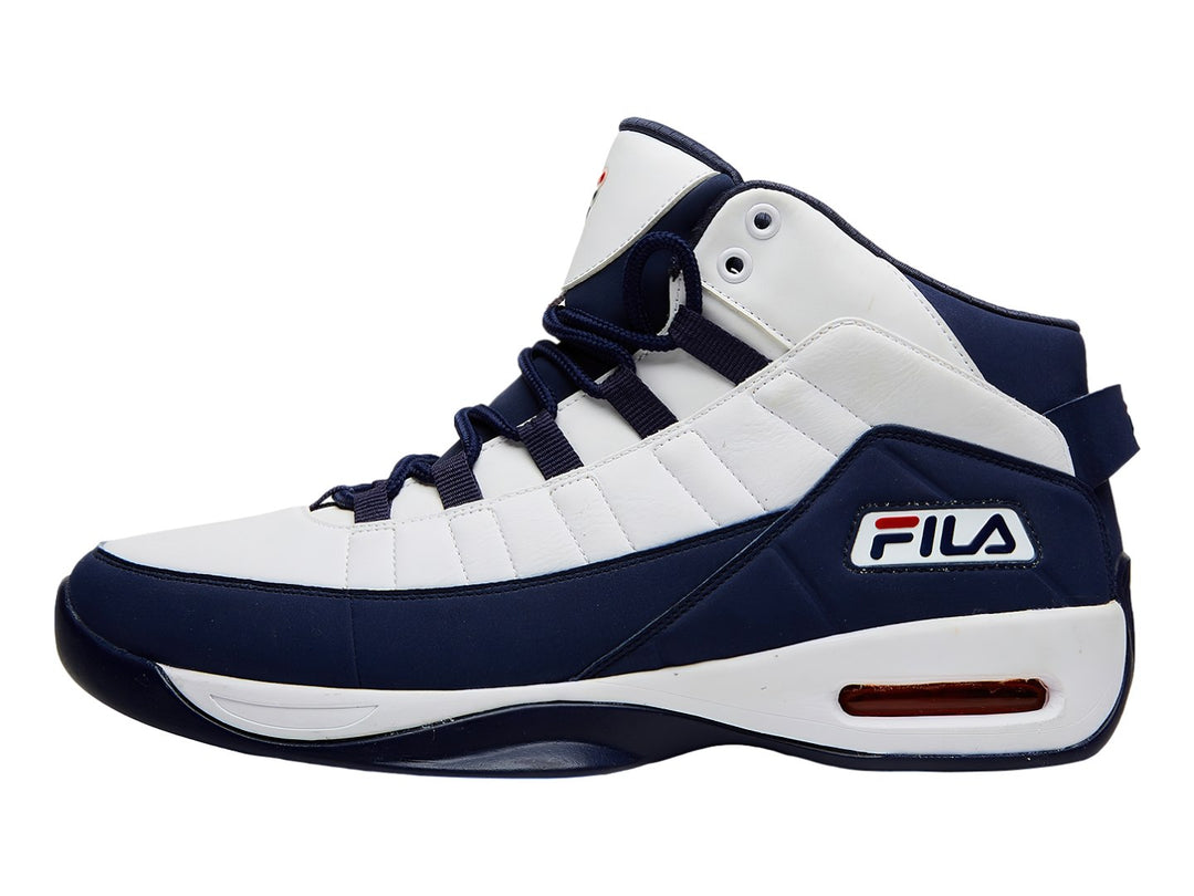 Tenis de baloncesto FILA Eight-Five Viz en colores blanco y azul marino con detalles en rojo.