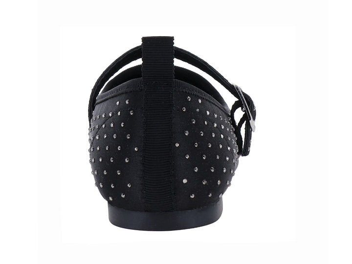 Zapato plano negro con correa, hebilla plateada y pequeños brillantes decorativos.