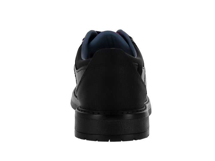 Zapato infantil VAVITO de color negro, estilo formal con cordones y suela resistente.