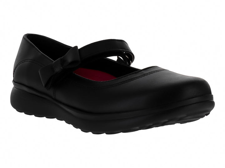 Zapato negro para niña estilo Mary Jane con correa y suela dentada.