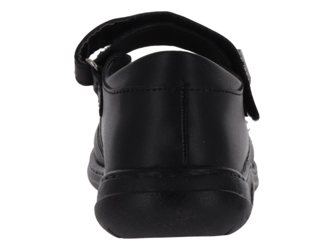 Zapato negro para niña estilo Mary Jane con correa y detalle de flor en la punta.