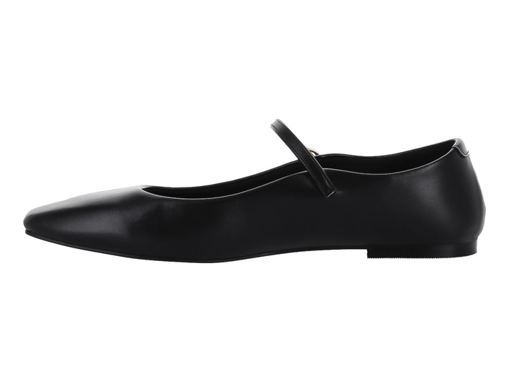 Zapato plano color negro con correa y hebilla dorada, estilo Mary Jane.