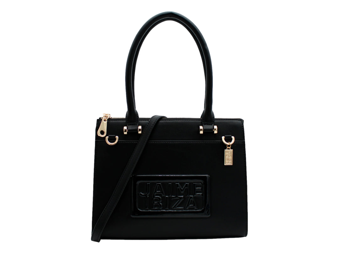 Bolso satchel negro de Jaime Ibiza con asa superior, correa larga y detalles metálicos en color dorado.
