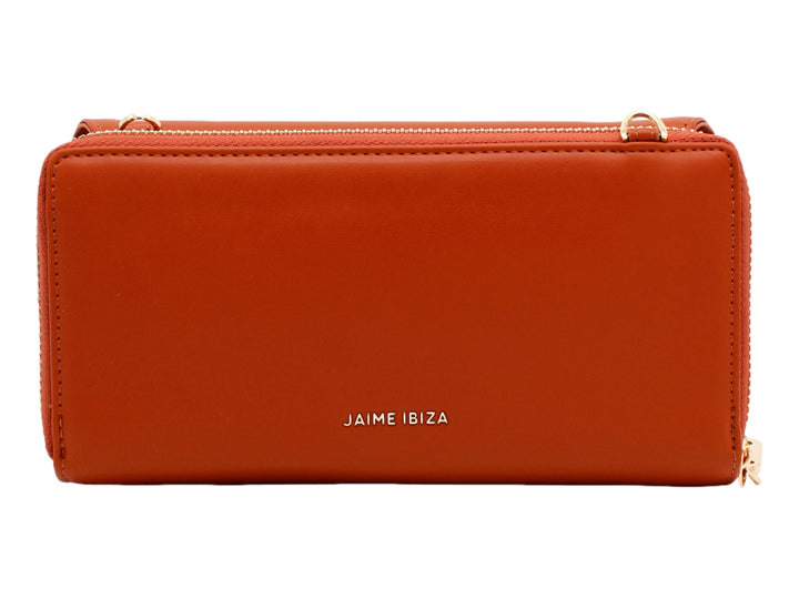 Bolso estilo cartera color caramelo de la marca Jaime Ibiza con correa y detalles en dorado.