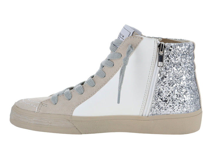 Tenis Corina blancos de bota alta con detalles en glitter plateado y suela beige.