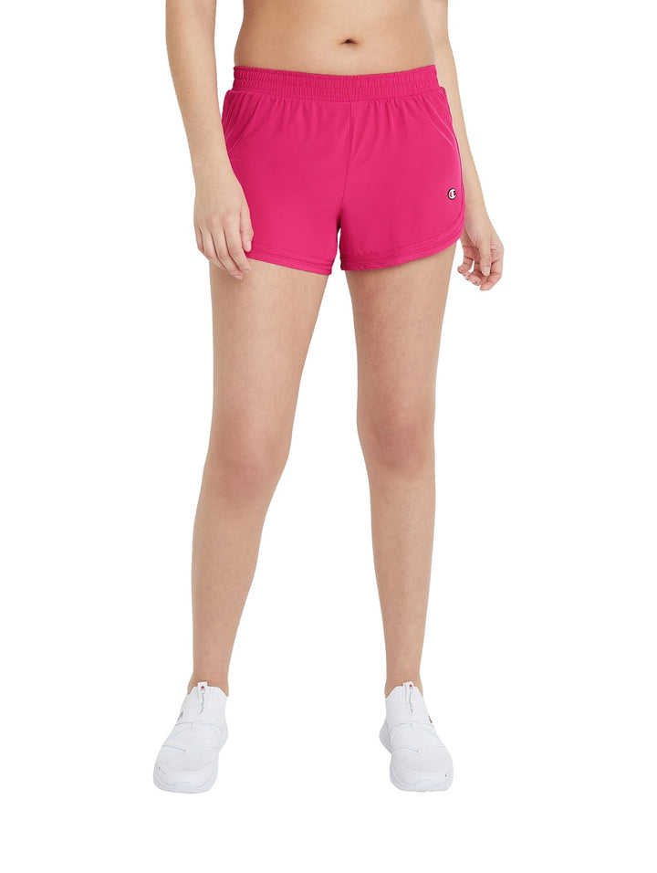 Pantalones cortos deportivos color fucsia de la marca Champion para mujer.