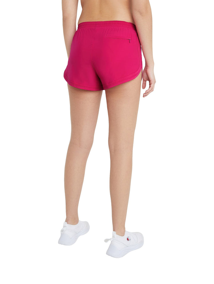 Pantalones cortos deportivos color fucsia de la marca Champion para mujer.