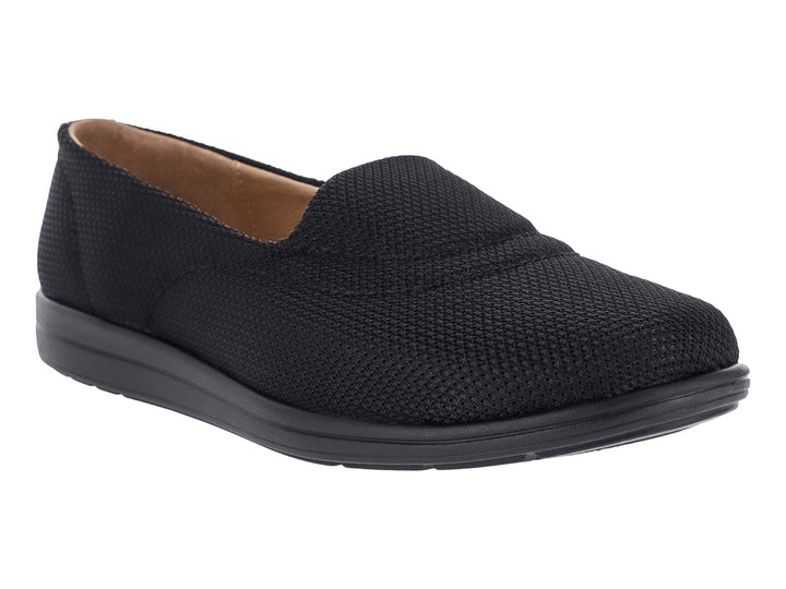 Zapato plano estilo slip-on de malla color negro con suela cómoda y diseño casual.