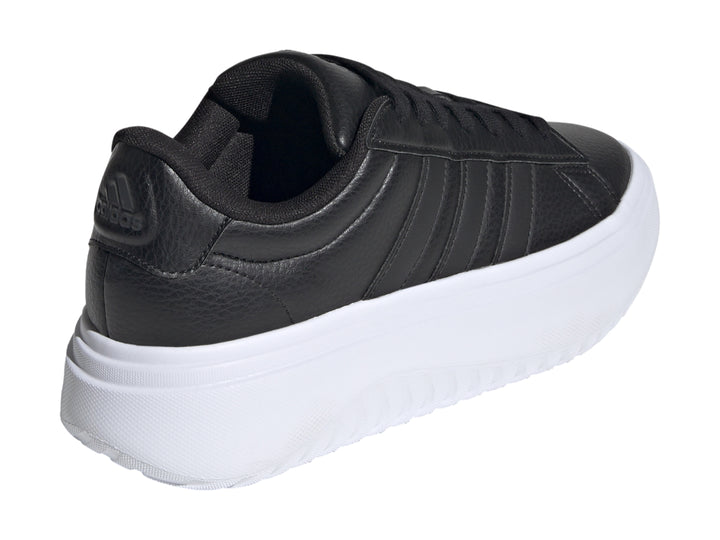 Tenis Adidas Grand Court plataforma color negro con suela blanca ancha.