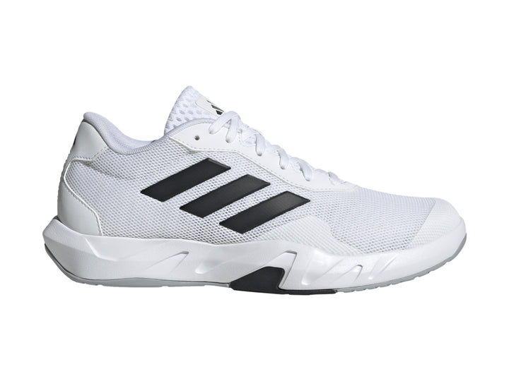 Tenis de entrenamiento Adidas Amplimove en color blanco con tres franjas negras laterales y suela blanca.