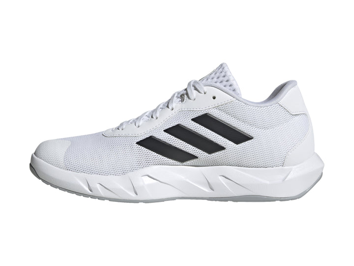 Tenis de entrenamiento Adidas Amplimove en color blanco con tres franjas negras laterales y suela blanca.