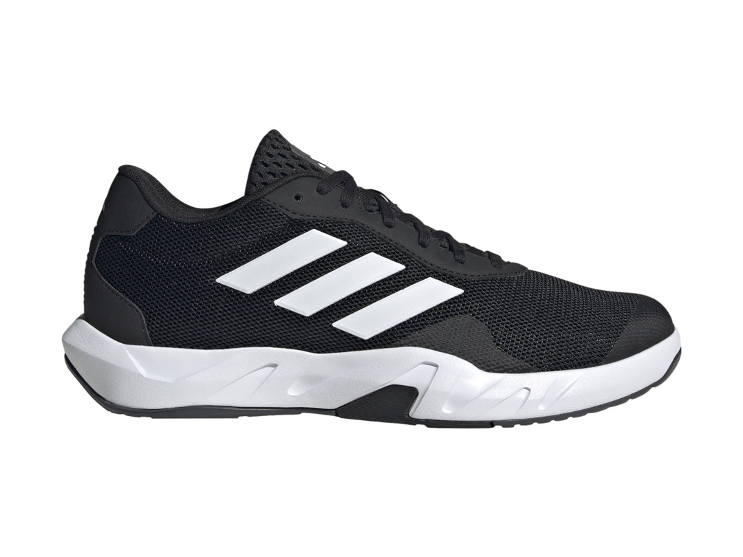 Tenis Adidas Amplimove en color negro con tres franjas blancas laterales y suela blanca.