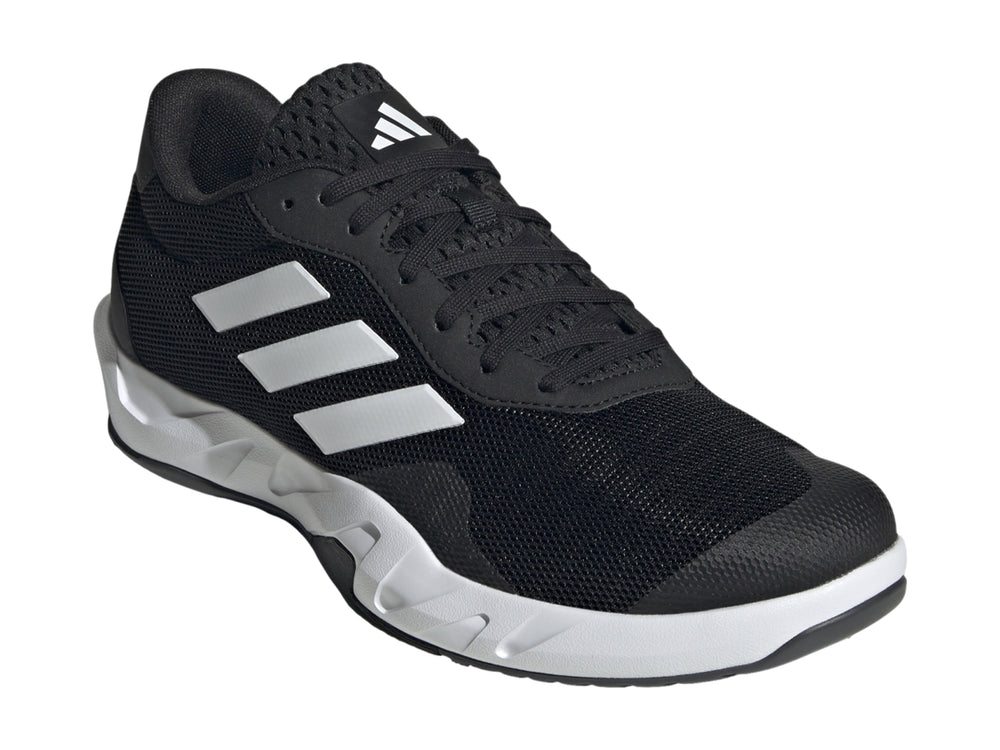 Tenis Adidas Amplimove en color negro con tres franjas blancas laterales y suela blanca.