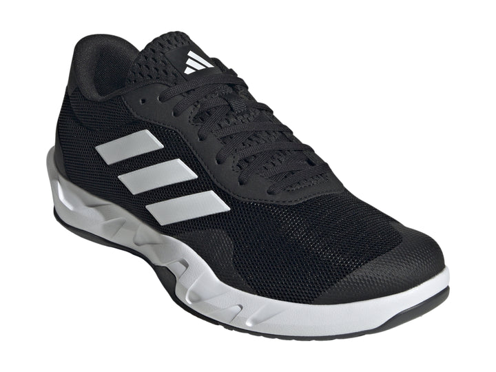 Tenis Adidas Amplimove en color negro con tres franjas blancas laterales y suela blanca.