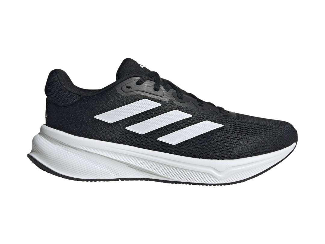 Tenis deportivos Adidas Response en color negro con suela y franjas laterales en blanco.