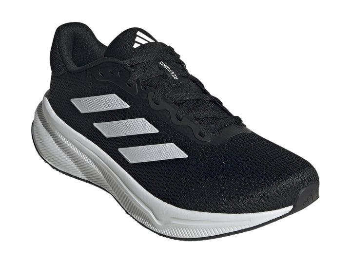 Tenis deportivos Adidas Response en color negro con suela y franjas laterales en blanco.