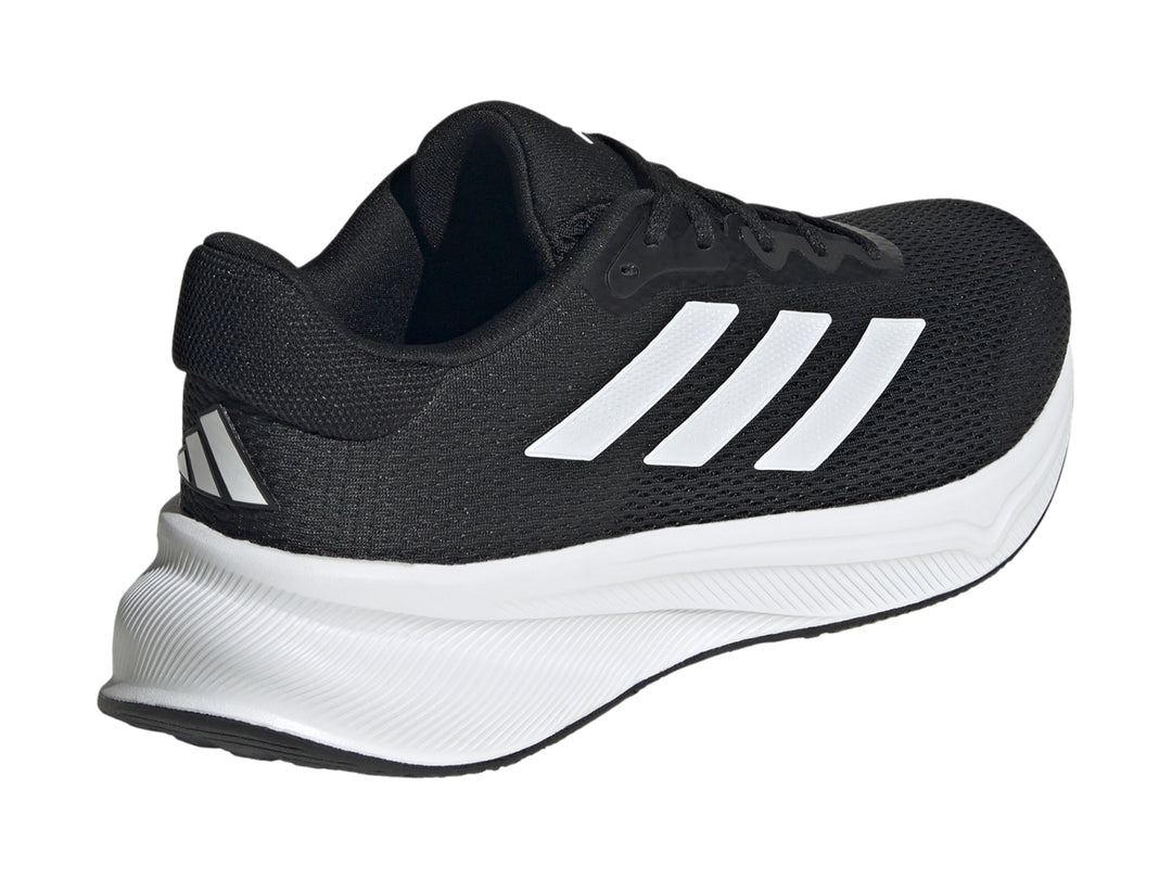 Tenis deportivos Adidas Response en color negro con suela y franjas laterales en blanco.