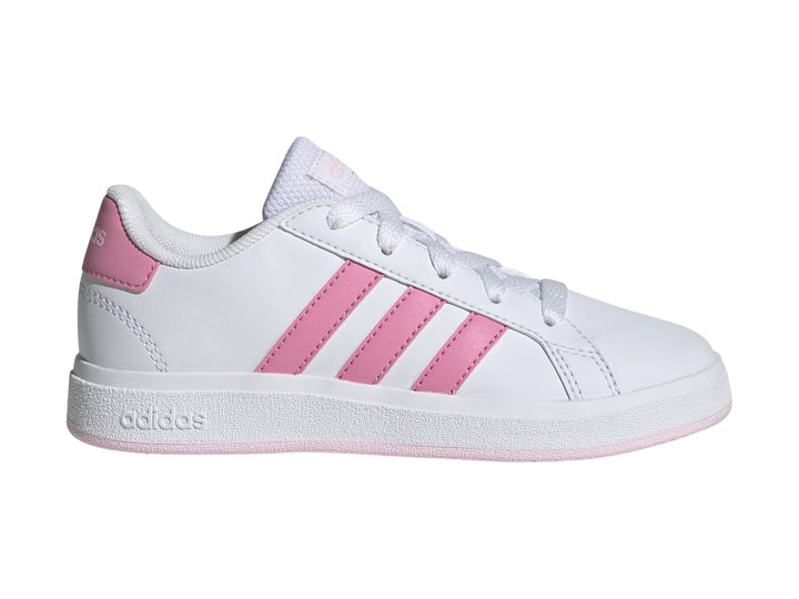 Tenis Adidas blancos con tres franjas rosas y suela rosa.