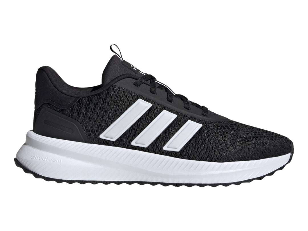Tenis deportivos Adidas color negro con franjas y suela blanca.
