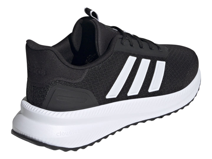 Tenis deportivos Adidas color negro con franjas y suela blanca.