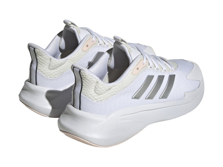 Tenis Adidas Alphaedge + 22 en color blanco con franjas plateadas y detalles en rosa pálido.