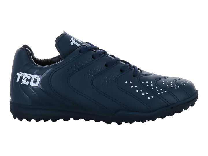 Zapato de fútbol Leon Trucco color marino con detalles blancos y suela para césped sintético.