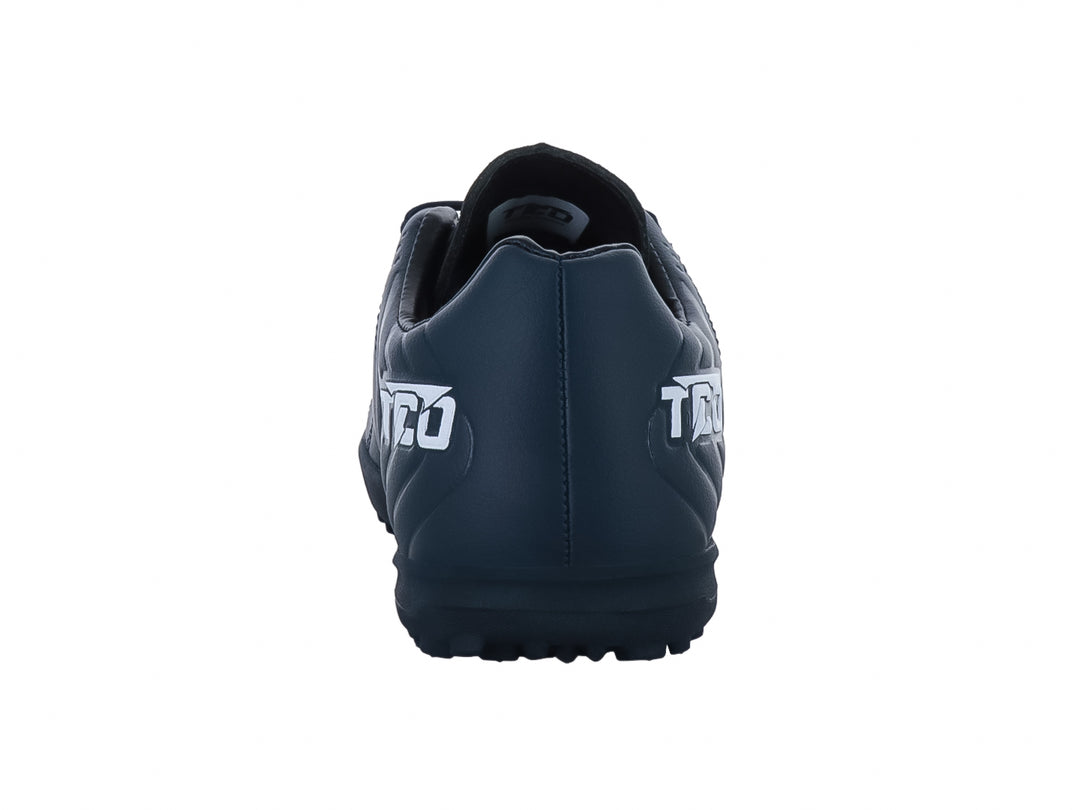 Zapato de fútbol Leon Trucco color marino con detalles blancos y suela para césped sintético.