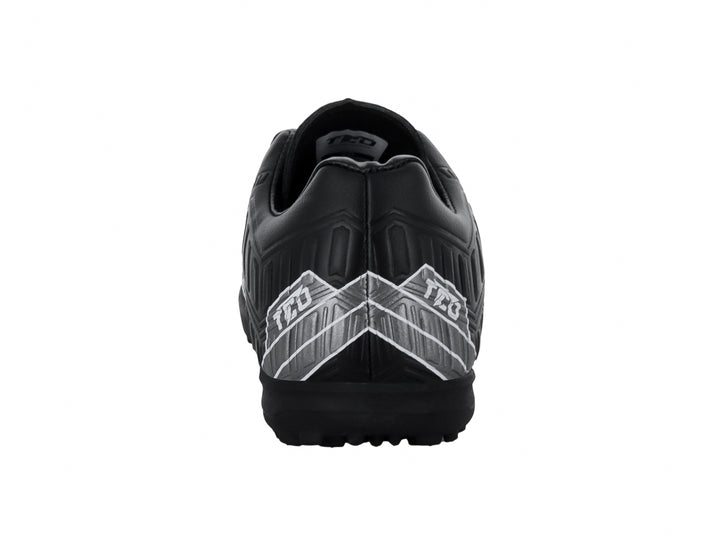 Zapato de fútbol Leon Trucco negro con detalles gráficos en blanco y suela para pasto sintético