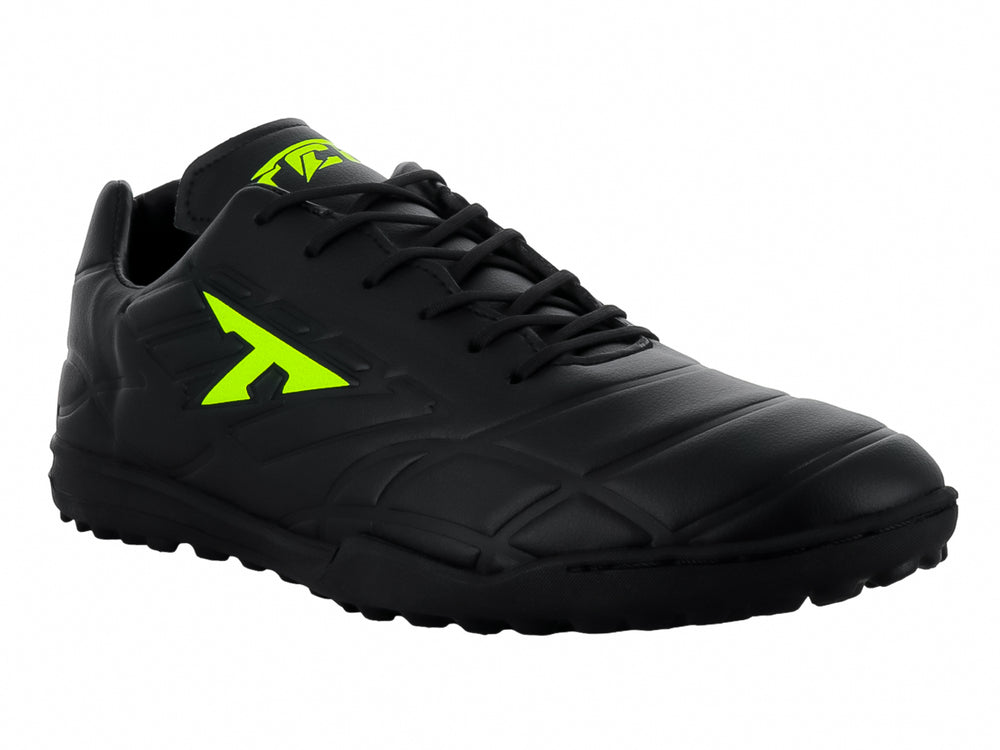 Zapato de fútbol Leon Trucco color negro con detalles en amarillo neón y suela para pasto sintético.